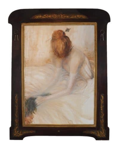 Balerina előrehajolva ül